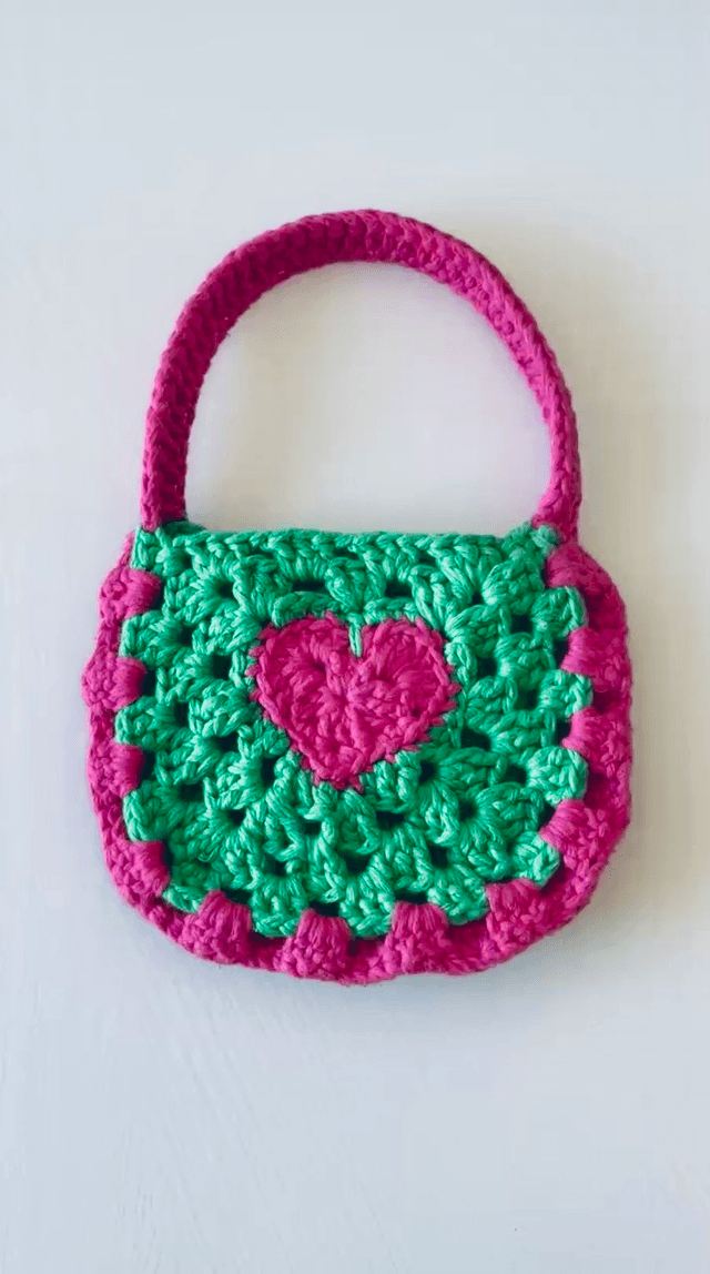 Sac Bourse Akoma, vert et rose fuchsia 